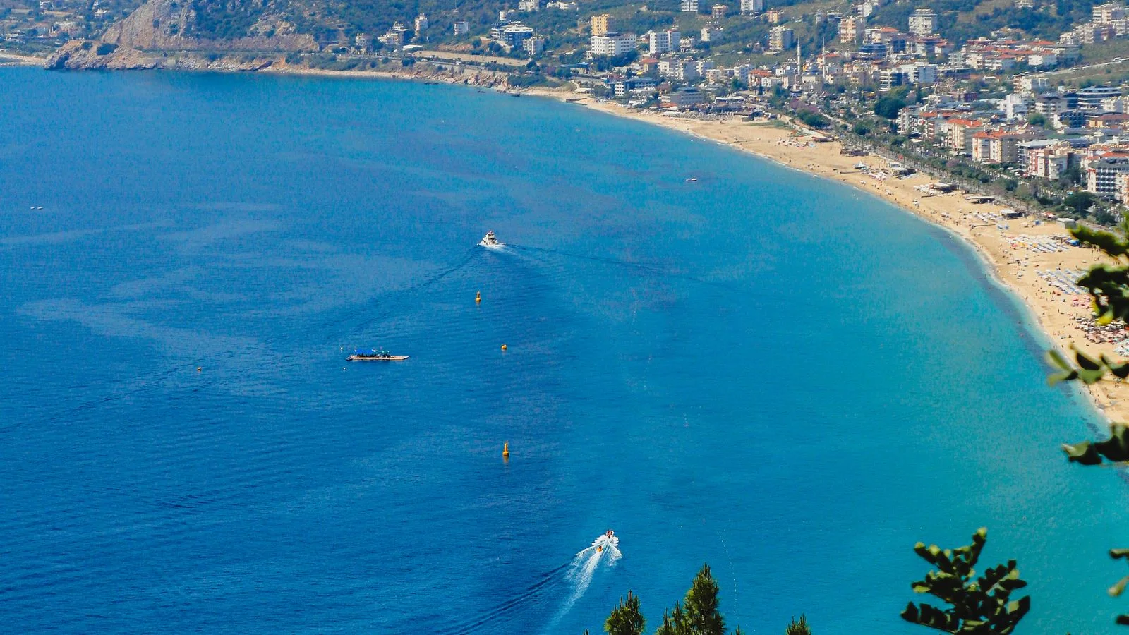 Panoramic view of Alanya beach, city and castle peninsula