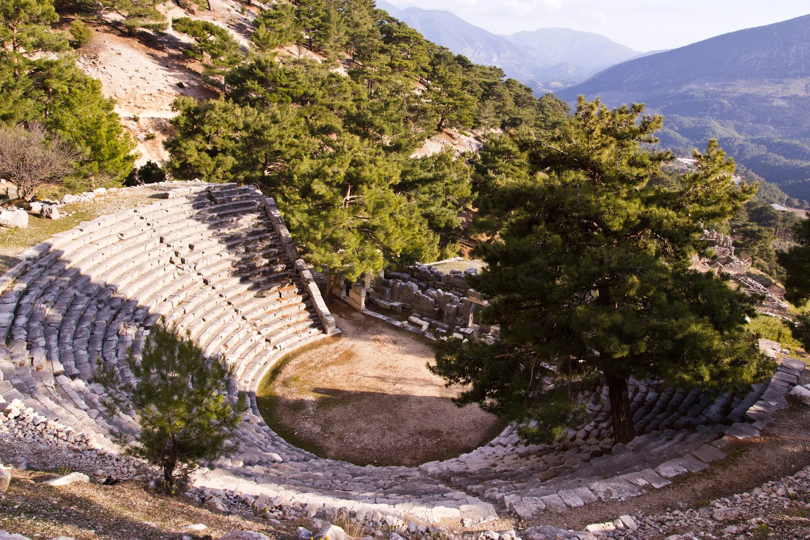 Ancient theatre of Arykanda on a forested mountain slope near Finike
