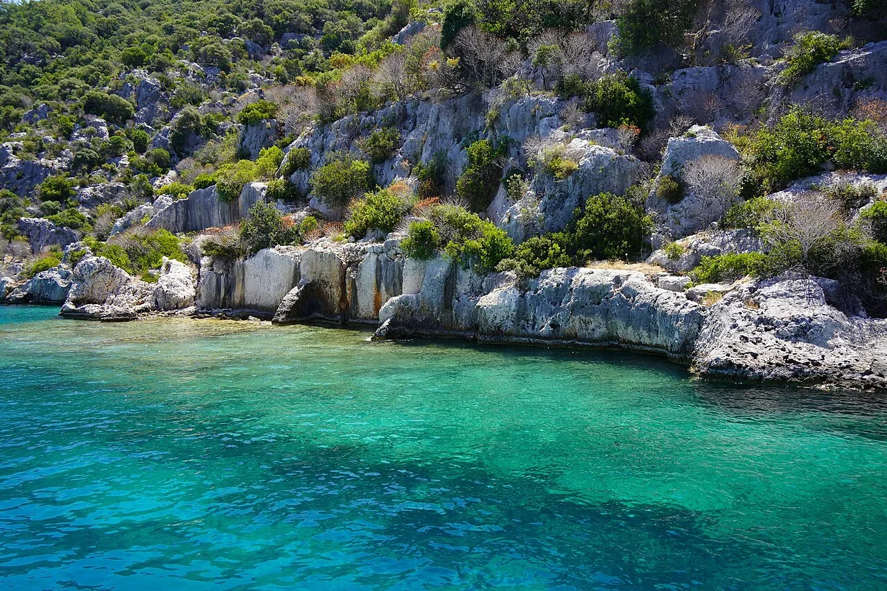 Rocky Kekova coast beside clear turquoise Mediterranean water near Demre