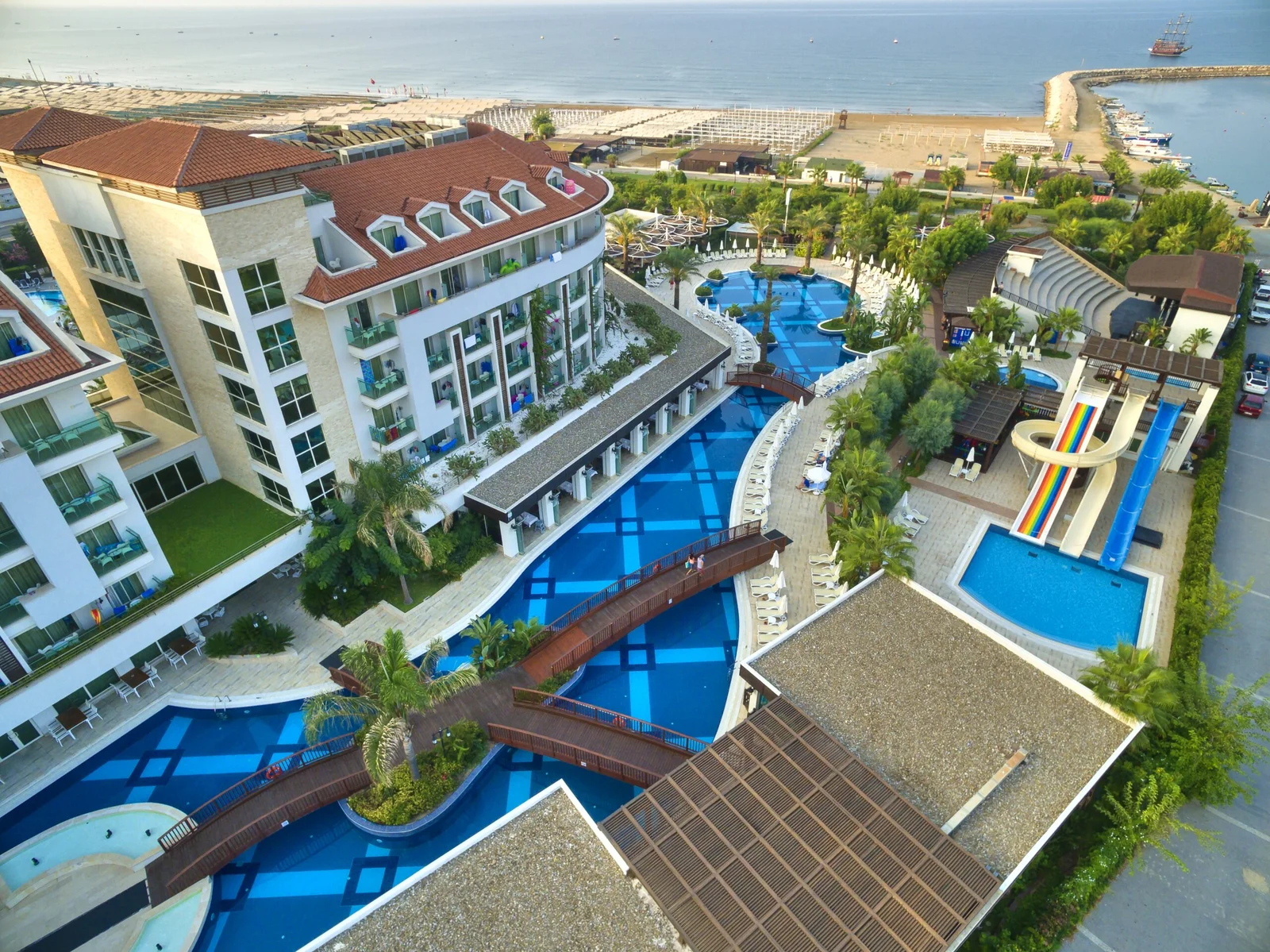 Aerial view of Sunis Evren Beach Resort, its pools and the sandy Evrenseki coast