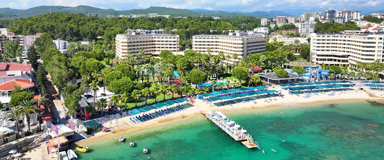 Aerial view of İncekum's sandy cove and resort coast