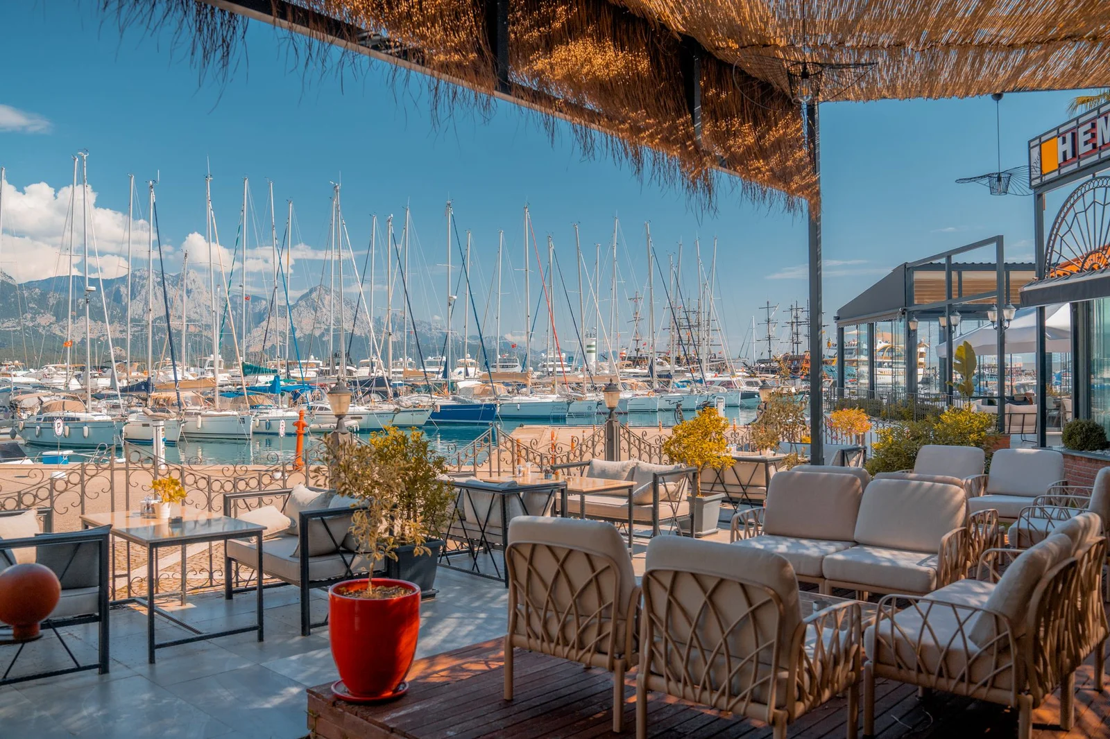 Waterfront café overlooking Kemer Marina and the Taurus Mountains
