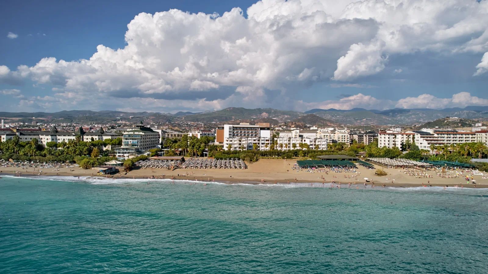 Konaklı resort coast with the beach, hotel buildings and Taurus foothills