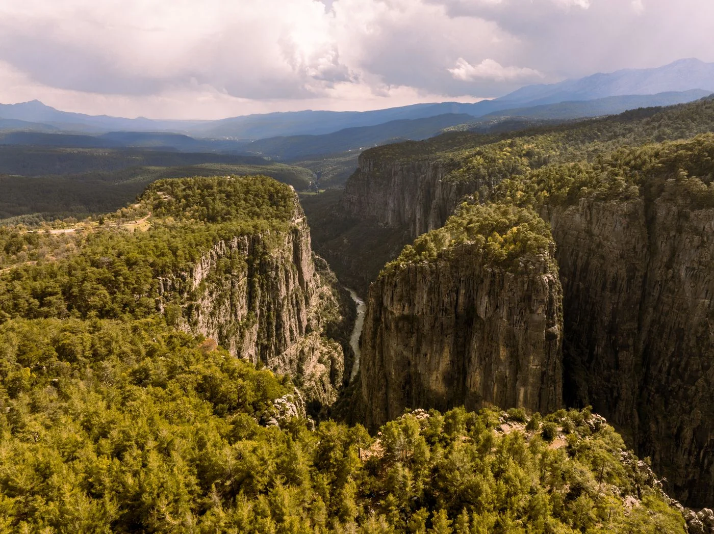 Aerial view of Tazı Canyon's rock walls and forests in Manavgat