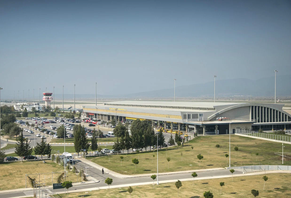 Wide view of Milas-Bodrum Airport terminal and control tower