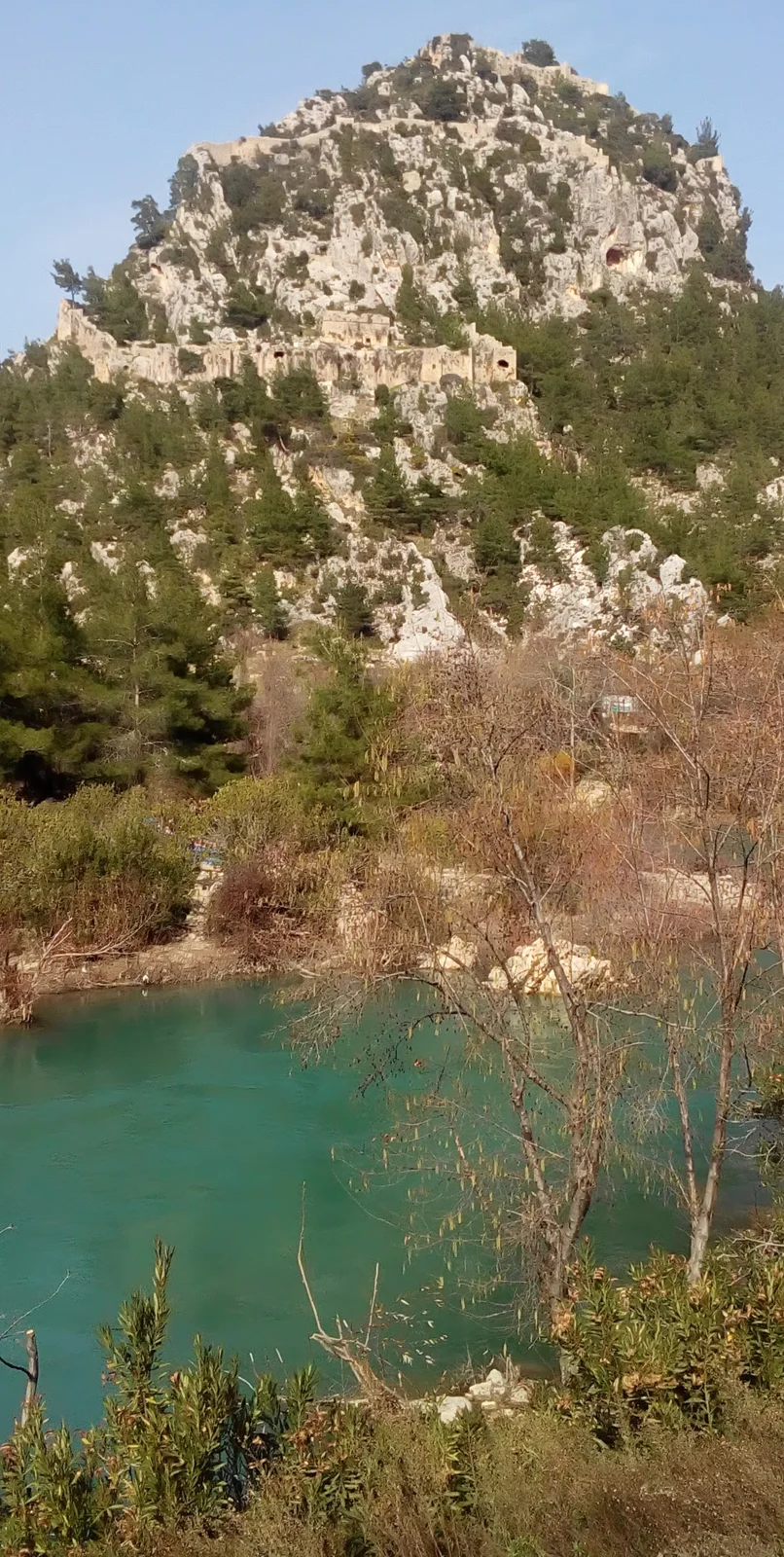 Alara Castle on its rocky hill above the Alara River near Okurcalar