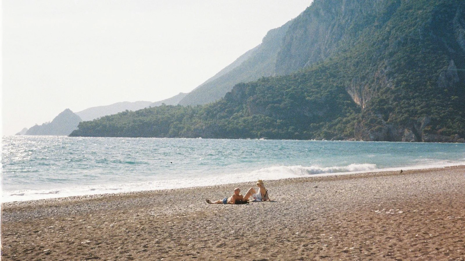 Olympos Beach on the Mediterranean beneath the forested mountains near Çıralı