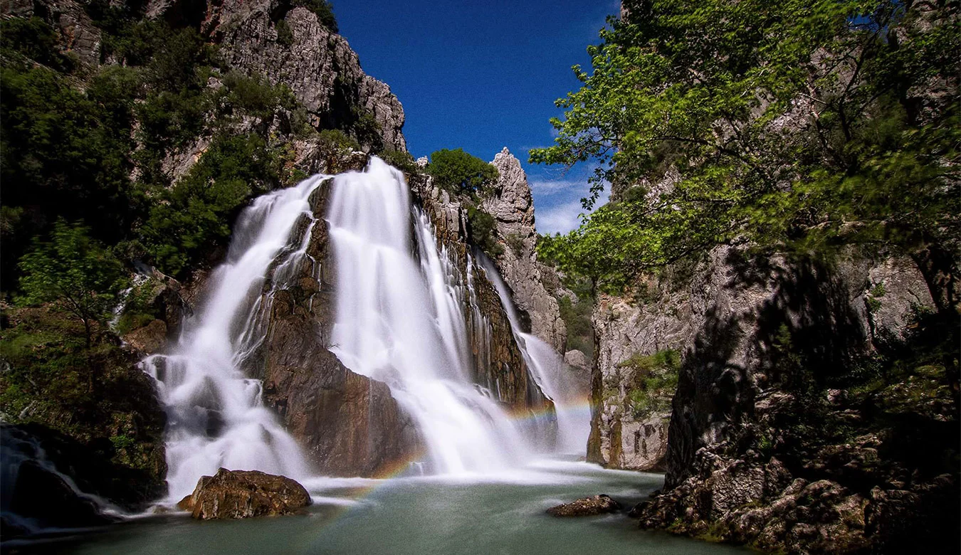 Uçansu Waterfall flowing through the rocky Taurus landscape in Serik