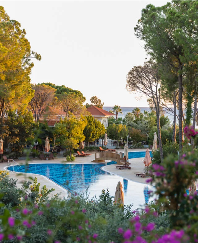 Pine garden, pool and Mediterranean view at Ali Bey Resort Sorgun